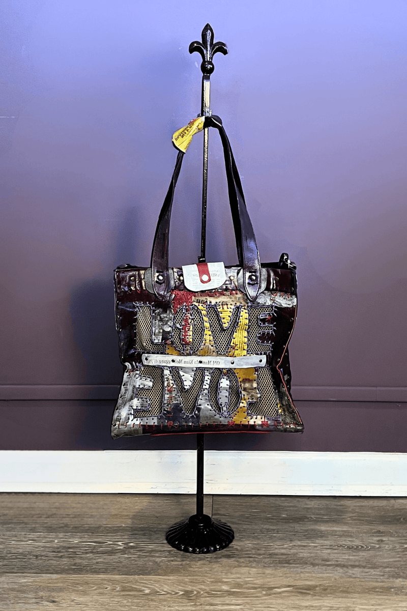 2. Love Crossbody Leather Tote