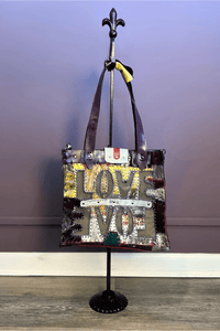 2. Love Crossbody Leather Tote