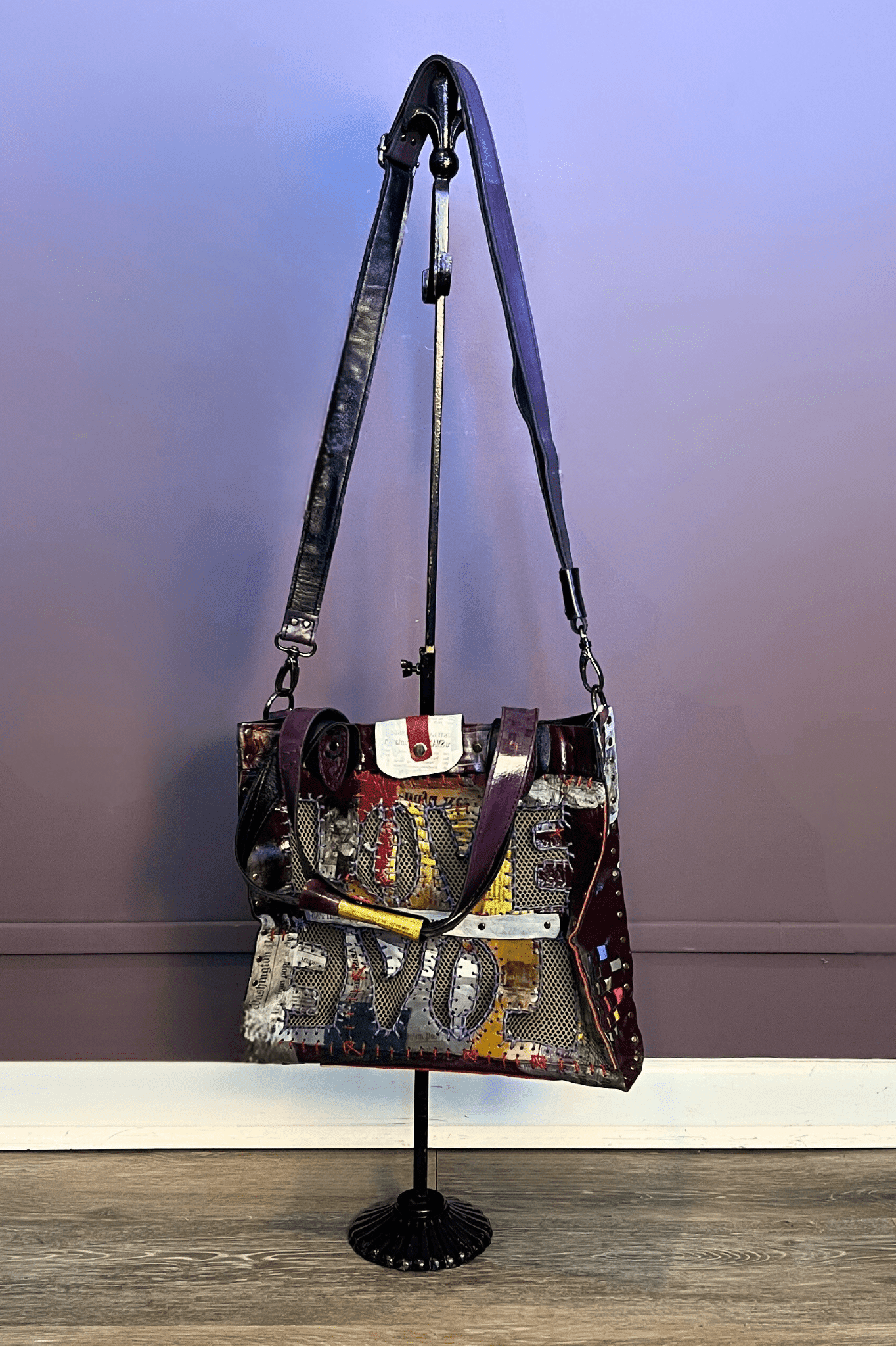 2. Love Crossbody Leather Tote